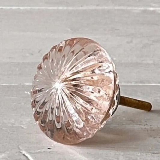 Rose Quartz Pink Glass Knob Vintage-style faceted glass knob with soft pink tint and brass fitting, perfect for furniture and cabinetry.