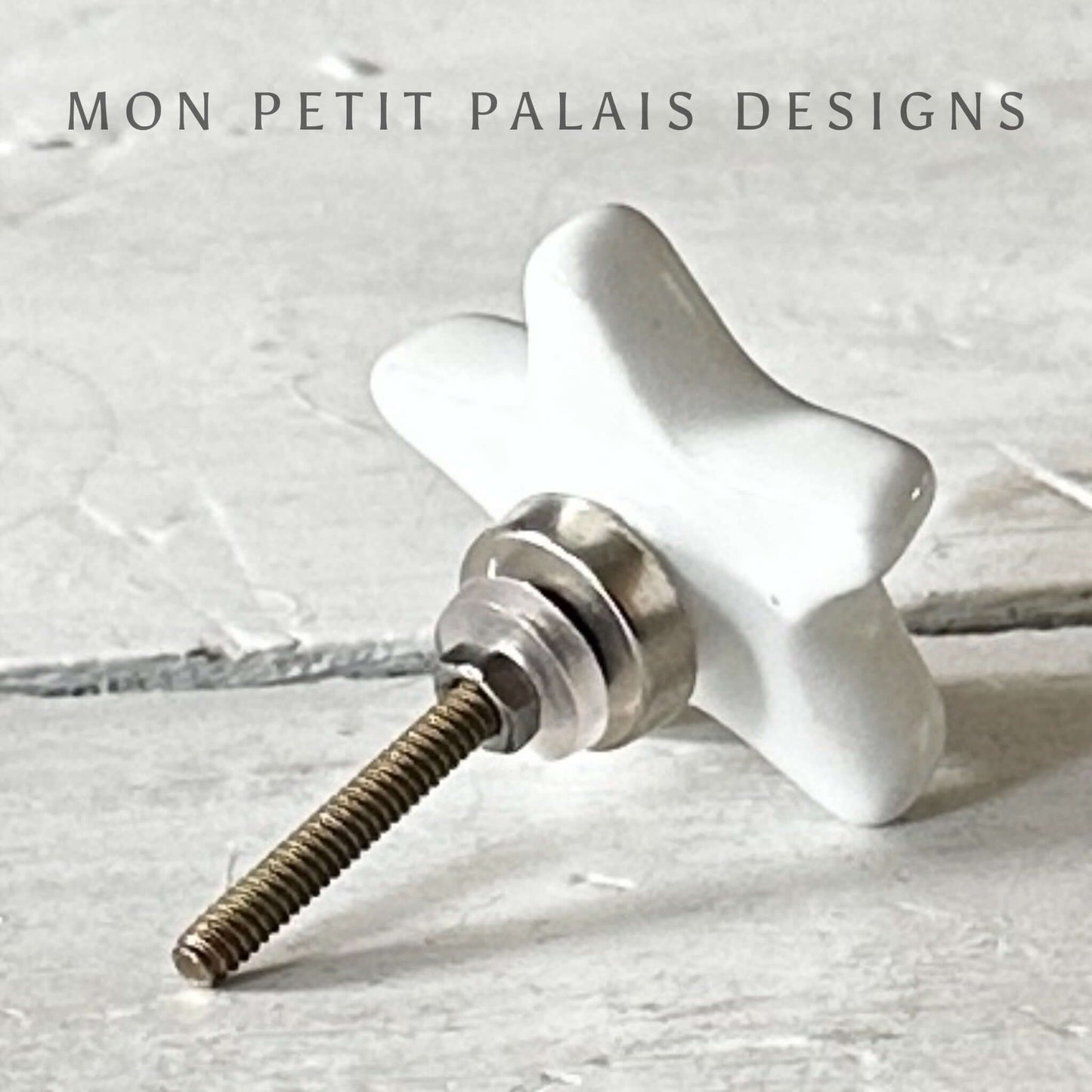 Rear view of a white ceramic star knob