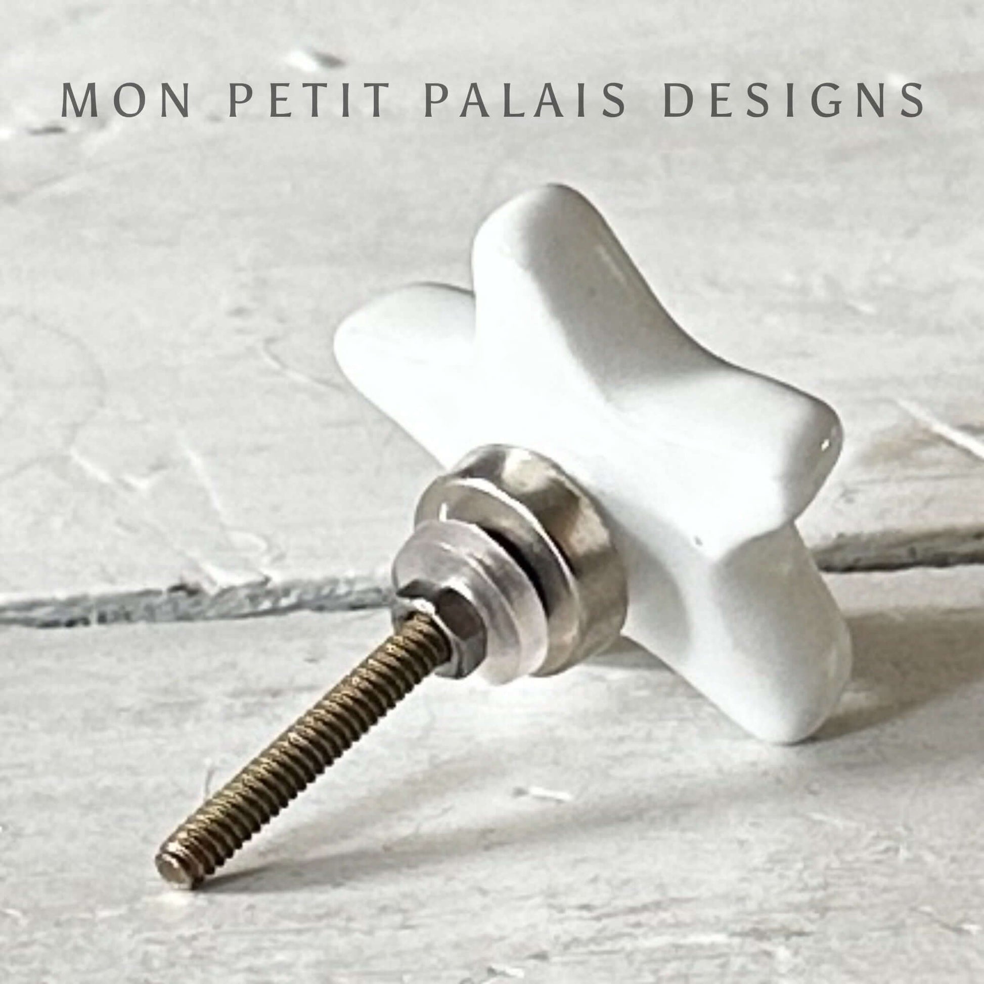 Rear view of a white ceramic star knob