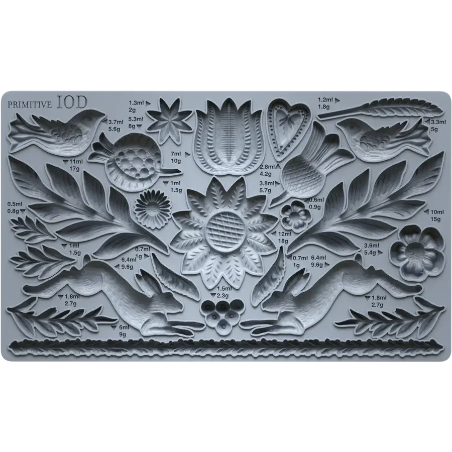 IOD Primitive Decor Mould featuring symmetrical designs with floral and animal motifs for crafting.
