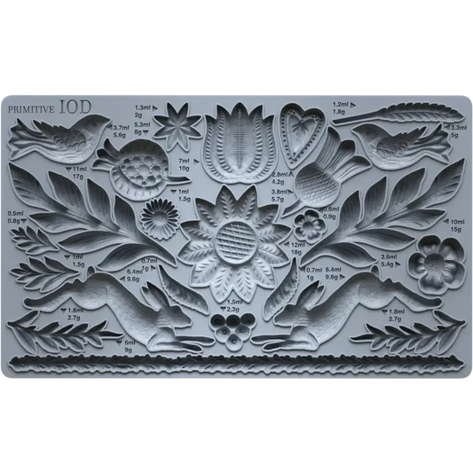 IOD Primitive Decor Mould featuring symmetrical designs with floral and animal motifs for crafting.