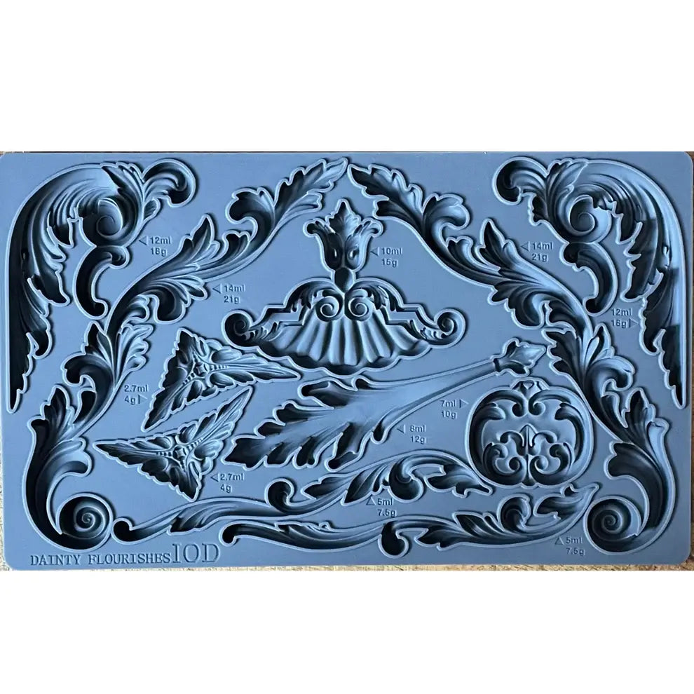 IOD Dainty Flourishes Decor Mould showing intricate scrollwork designs for DIY crafts and baking.