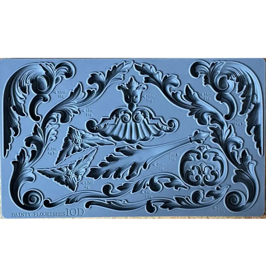 IOD Dainty Flourishes Decor Mould showing intricate scrollwork designs for DIY crafts and baking.