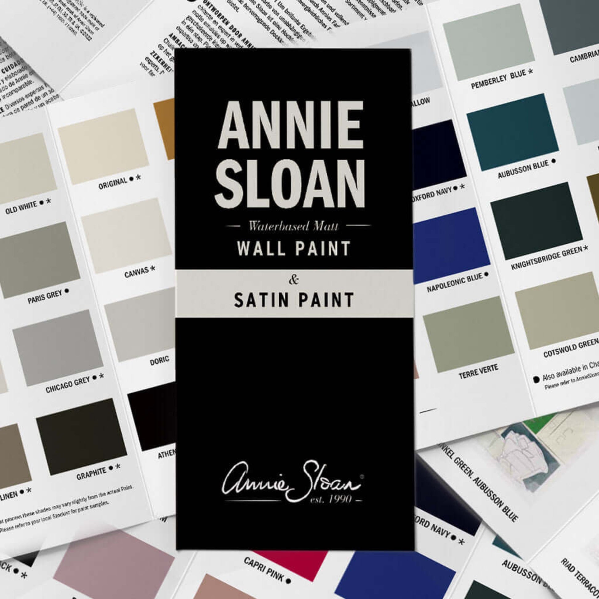 Annie Sloan paint swatch book with color samples on a white background