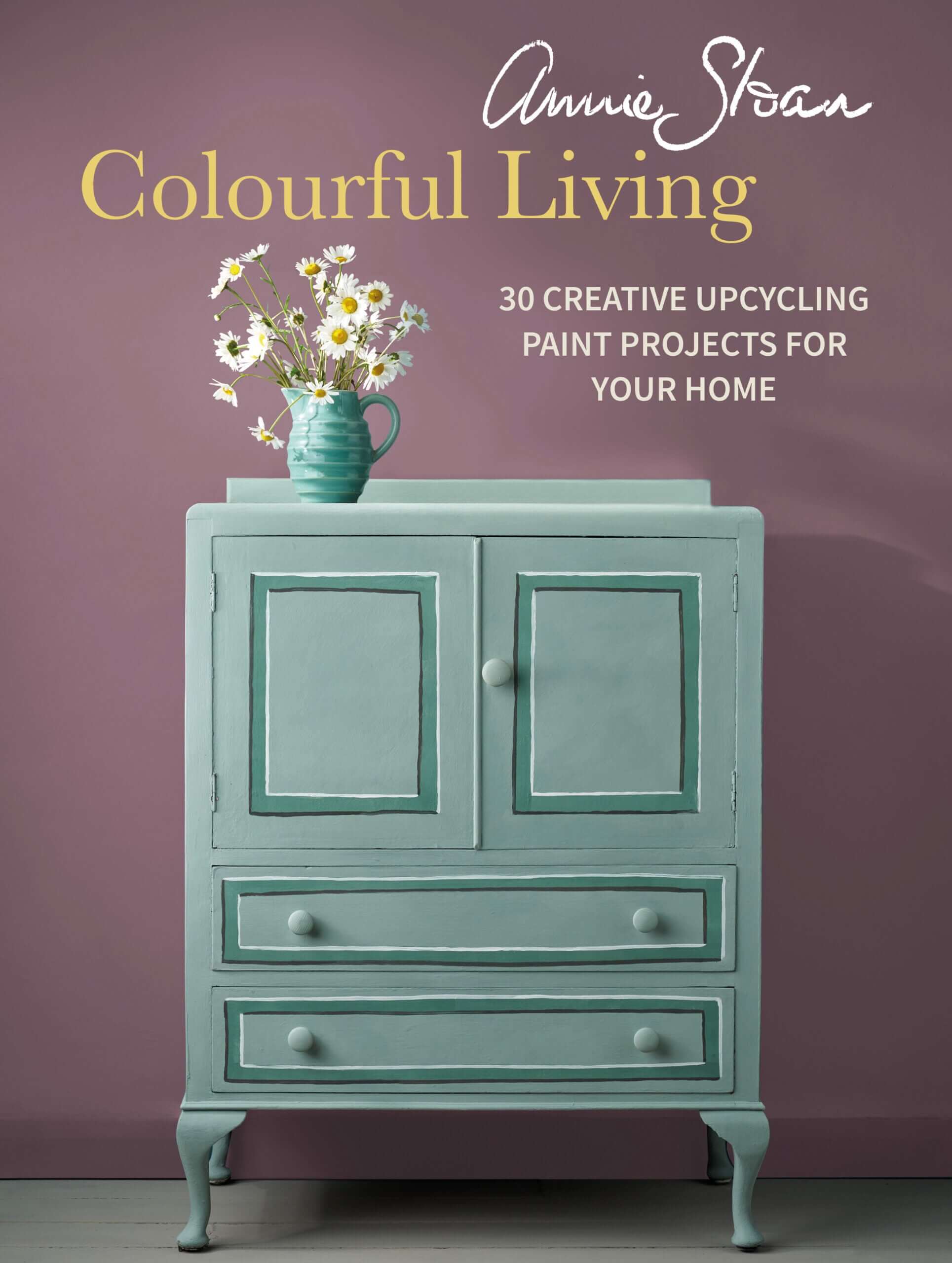 Colourful Living Book by Annie Sloan showcasing upcycled furniture and paint projects for home decor.