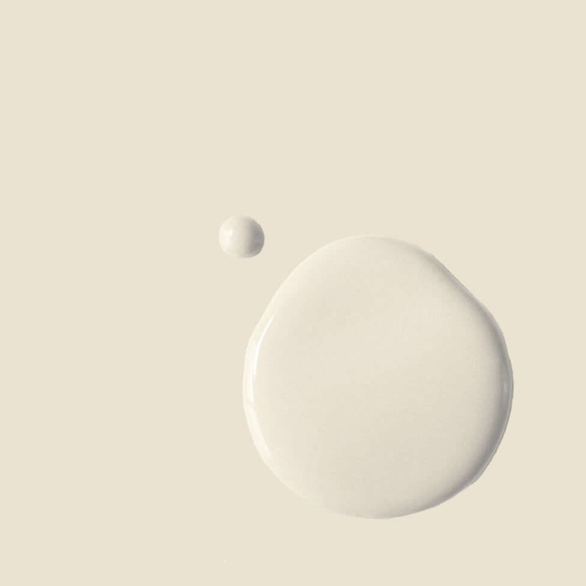 Original - Annie Sloan Satin Paint in creamy white, showcasing a paint droplet against a soft background.
