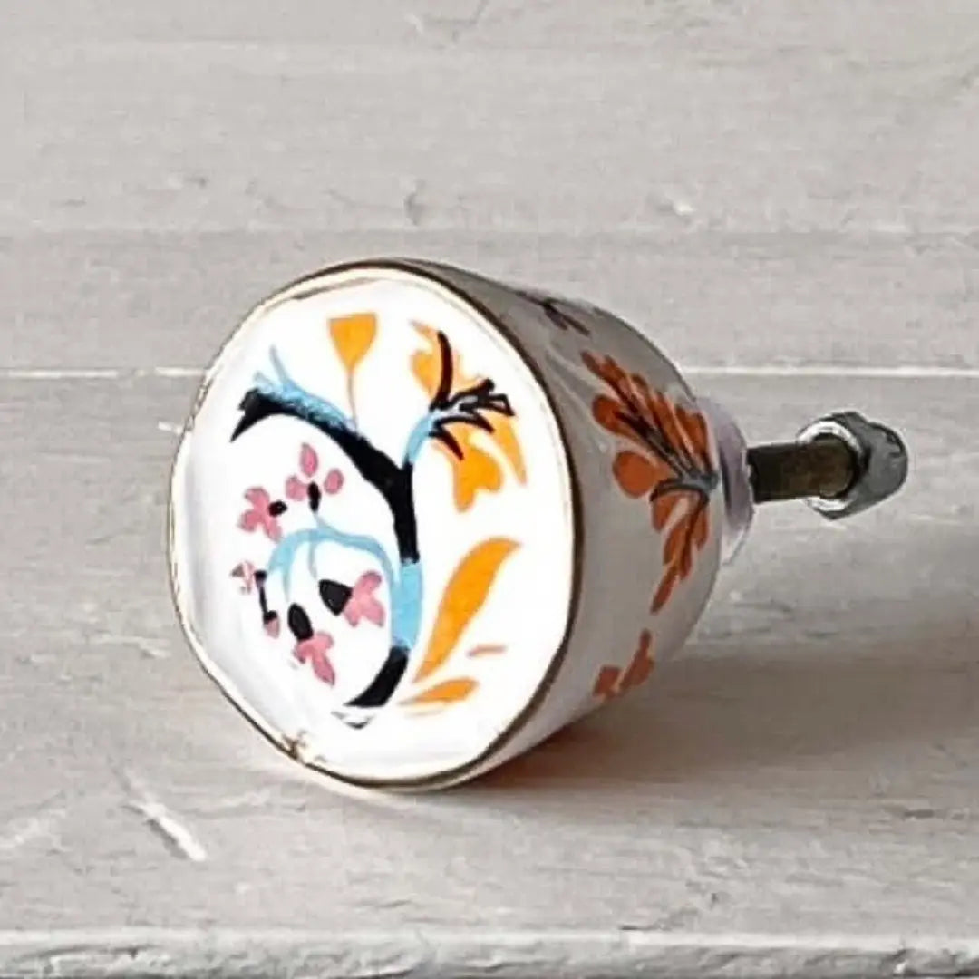 Orange & Blue Floral Hand-Painted Ceramic Knob showcasing vibrant floral design and unique artisan craftsmanship.