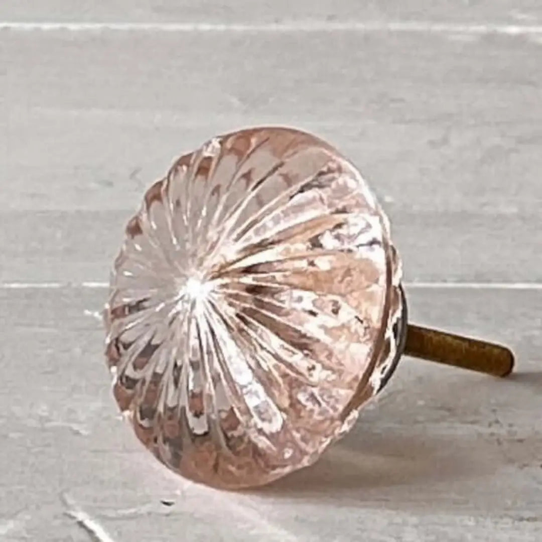Rose Quartz Pink Glass Knob Vintage-style faceted glass knob with soft pink tint and brass fitting, perfect for furniture and cabinetry.