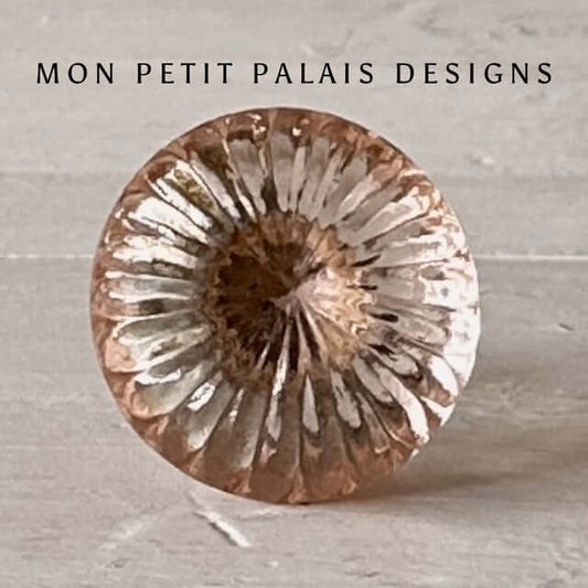 Rose Quartz Pink Glass Knob front view showcasing intricate fluted detailing and light-reflecting facets for an elegant vintage touch.