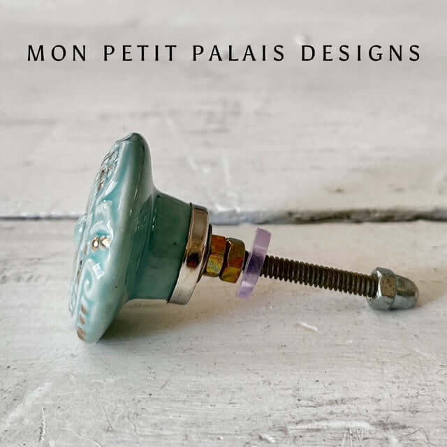 Side view of Seafoam Green Embossed Ceramic Cabinet Knob