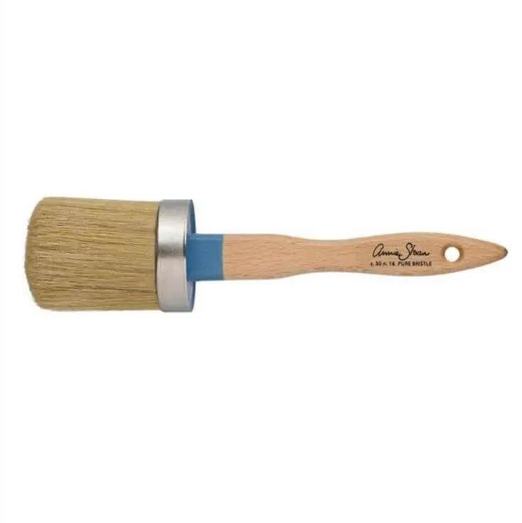 Annie Sloan Large Natural Bristle Paint Brush with wooden handle and blue ferrule.