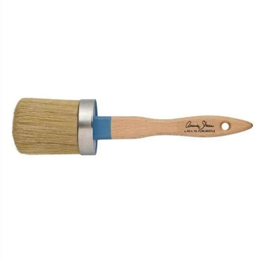 Annie Sloan Large Natural Bristle Paint Brush with wooden handle and blue ferrule.