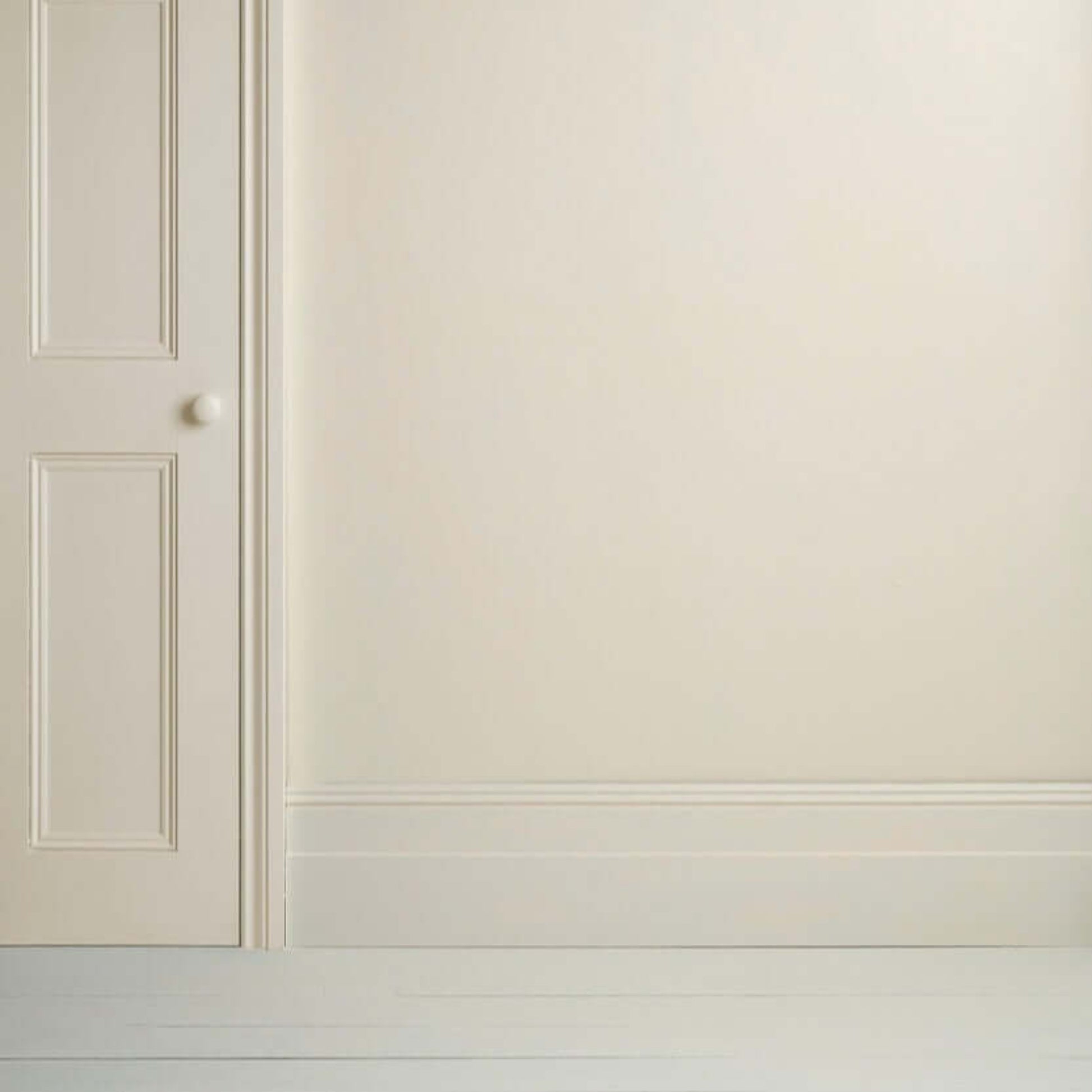 Original - Annie Sloan Satin Paint used on a door and wall, showcasing a warm creamy white color.