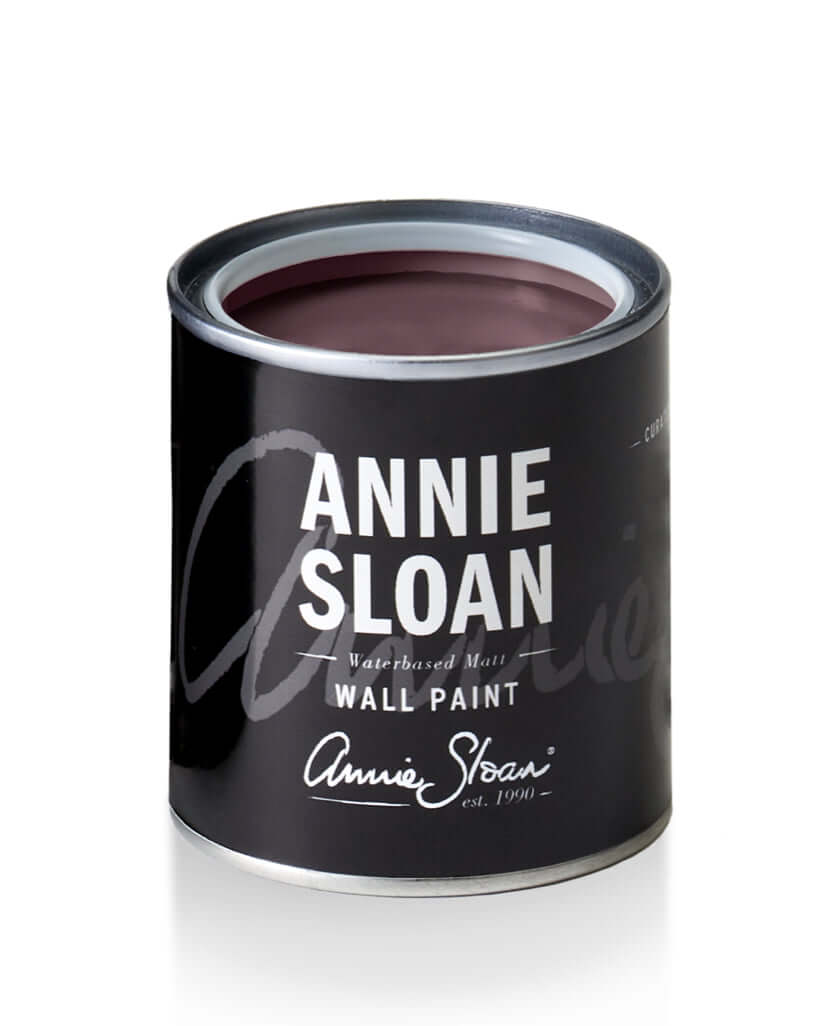 Tyrian Plum - Annie Sloan Wall Paint® in a black can with a rich plum color inside.