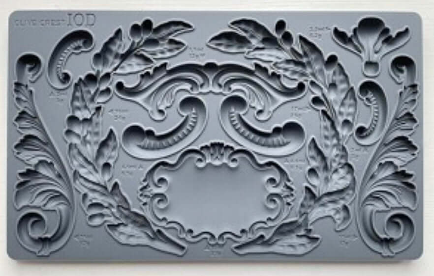 IOD Olive Crest Decor Mould featuring classic olive branches and scrollwork for crafts and furniture.