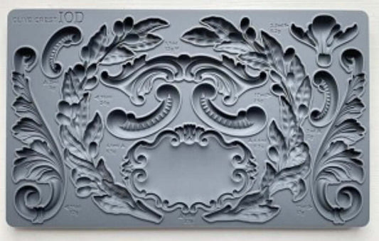 IOD Olive Crest Decor Mould featuring classic olive branches and scrollwork for crafts and furniture.