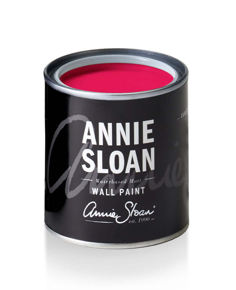 Capri Pink - Annie Sloan Wall Paint tin with vibrant pink color, featuring Annie Sloan branding in black.