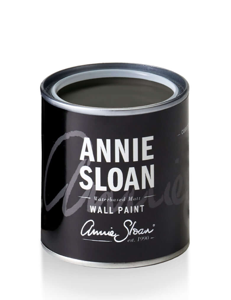 Graphite Annie Sloan wall paint can, showcasing a sleek black design with branding details.